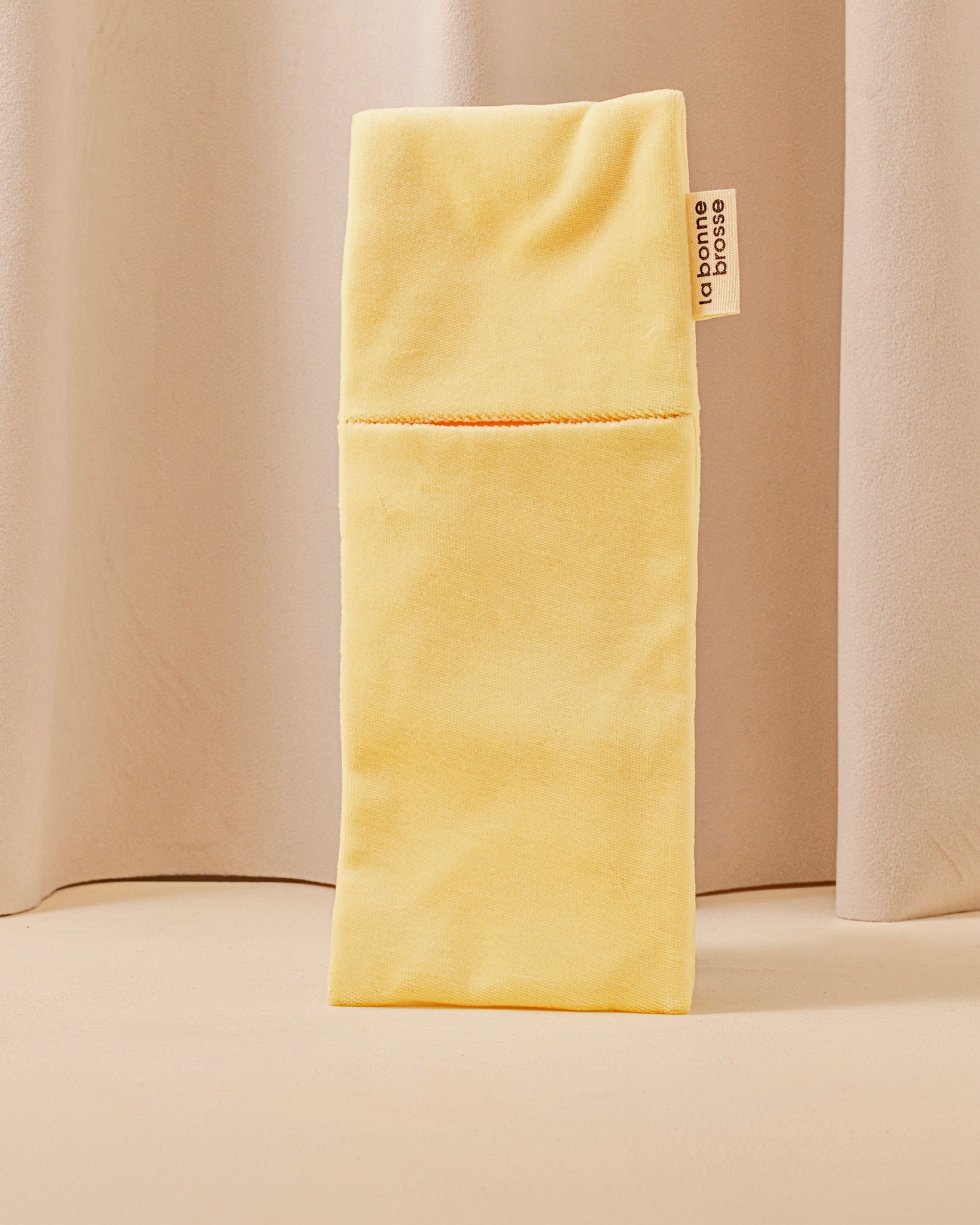 La Pochette "Grande Brosse" Ivoire Cair